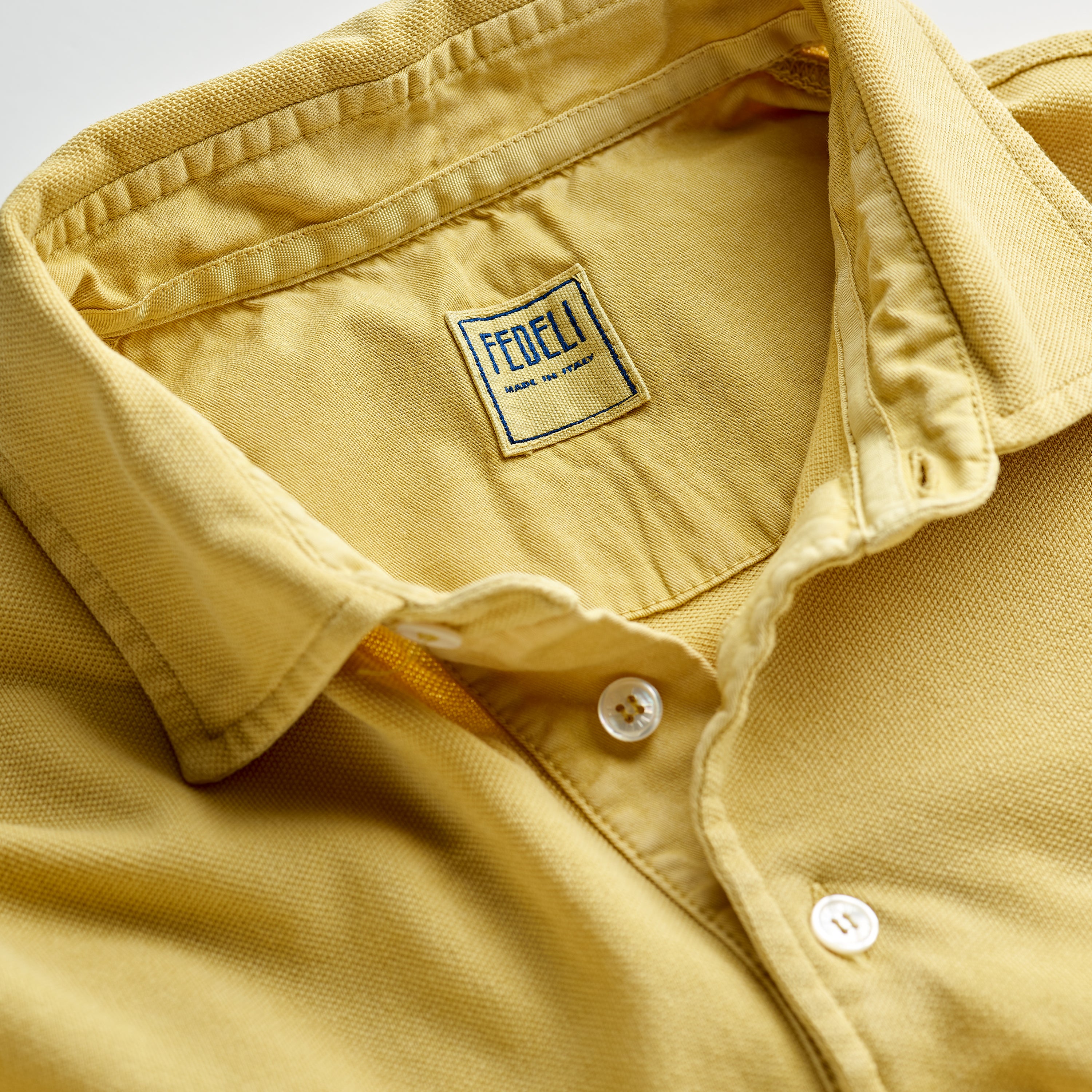 Fedeli Classic Short Sleeve Knitted Pique Polo Shirt in Mustard Yellow Collar